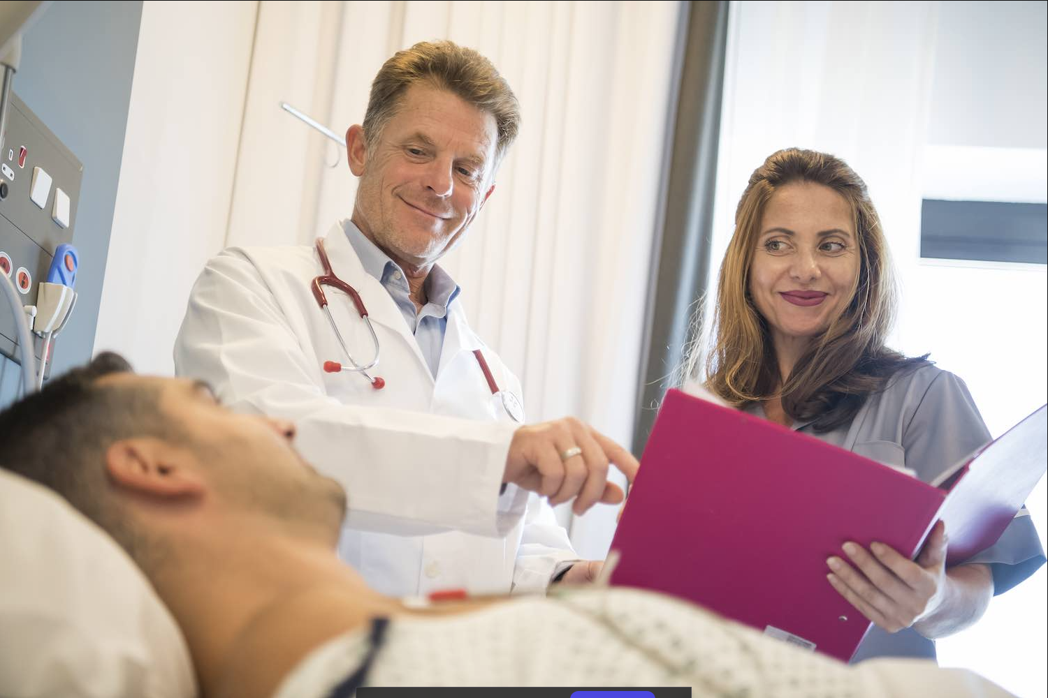 Picture of Doctor and patient in hospital room