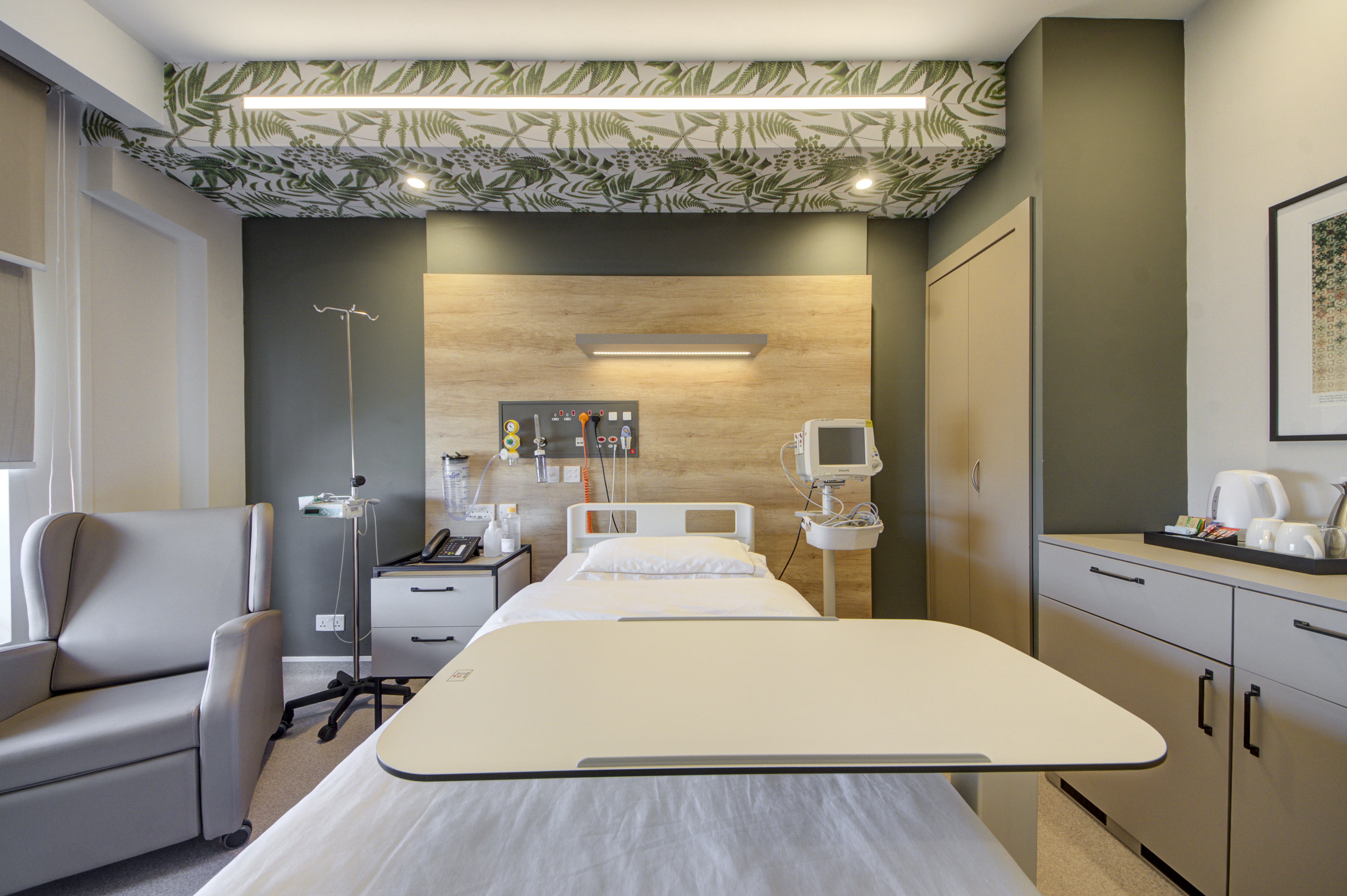 Image of bed and table in hospital room